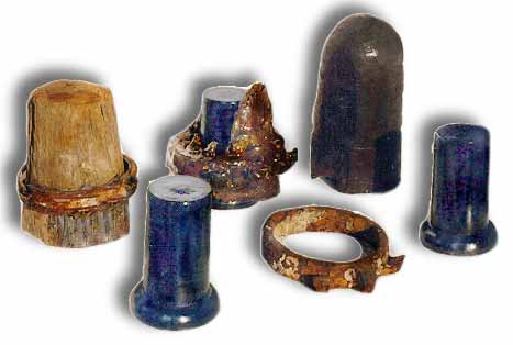 Different Wood Covered Canadian Wade Insulators