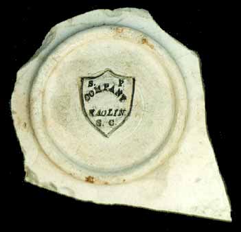 Incused mark as found on a china cup fragment.