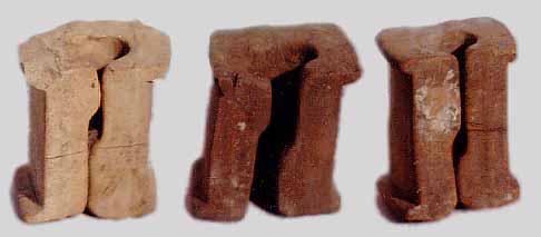 Unglazed blocks with curious, but typical one or two slash marks.