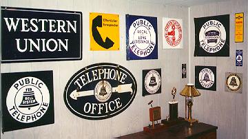 A Collection of Porcelain Telephone and Telegraph Signs